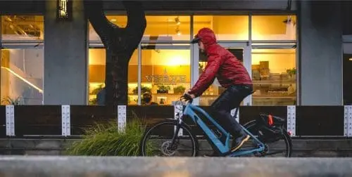 ecology-action-winter-bike-riding-rain-matt