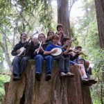 community-music-school-teens-on-a-tree
